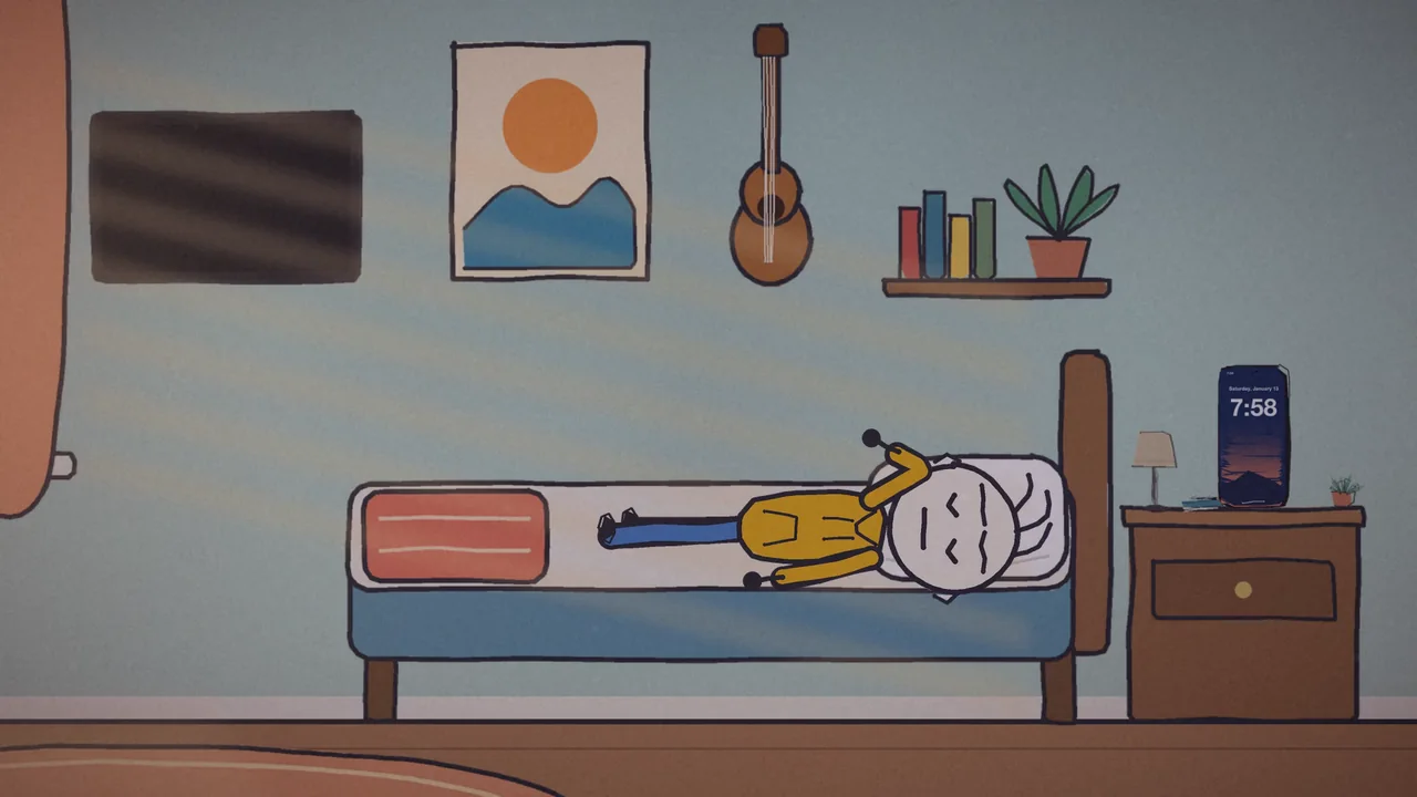 Zee asleep in bed, a phone on the nightstand reading 7:58, from the Hawaii alert video.